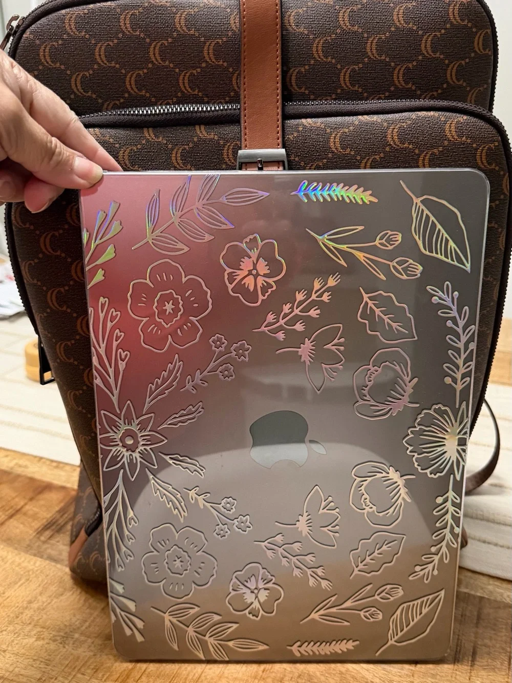 Cluci laptop Backpack with Crescent Pattern and different pockets.